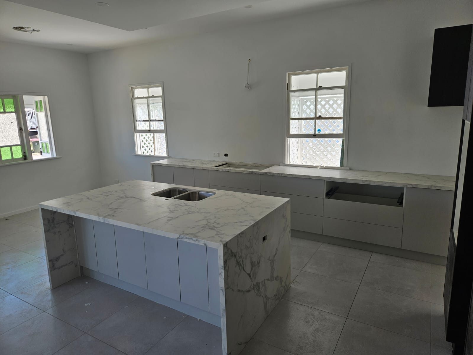 Smartstone marble-look waterfall island kitchen benchtop